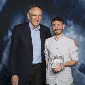 Damiano Cerrone accepting his ESRI Young Scholar Award in San Diego